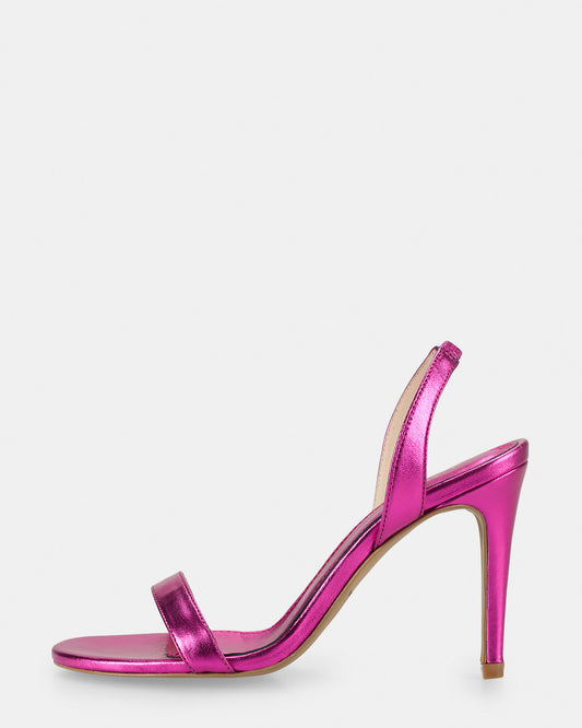 Leather sandals with heels by Carol Curry