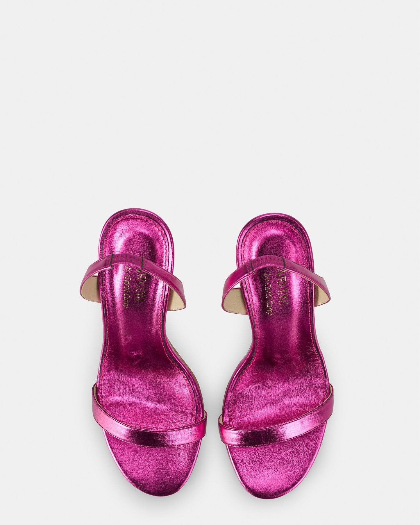 Leather sandals with heels by Carol Curry