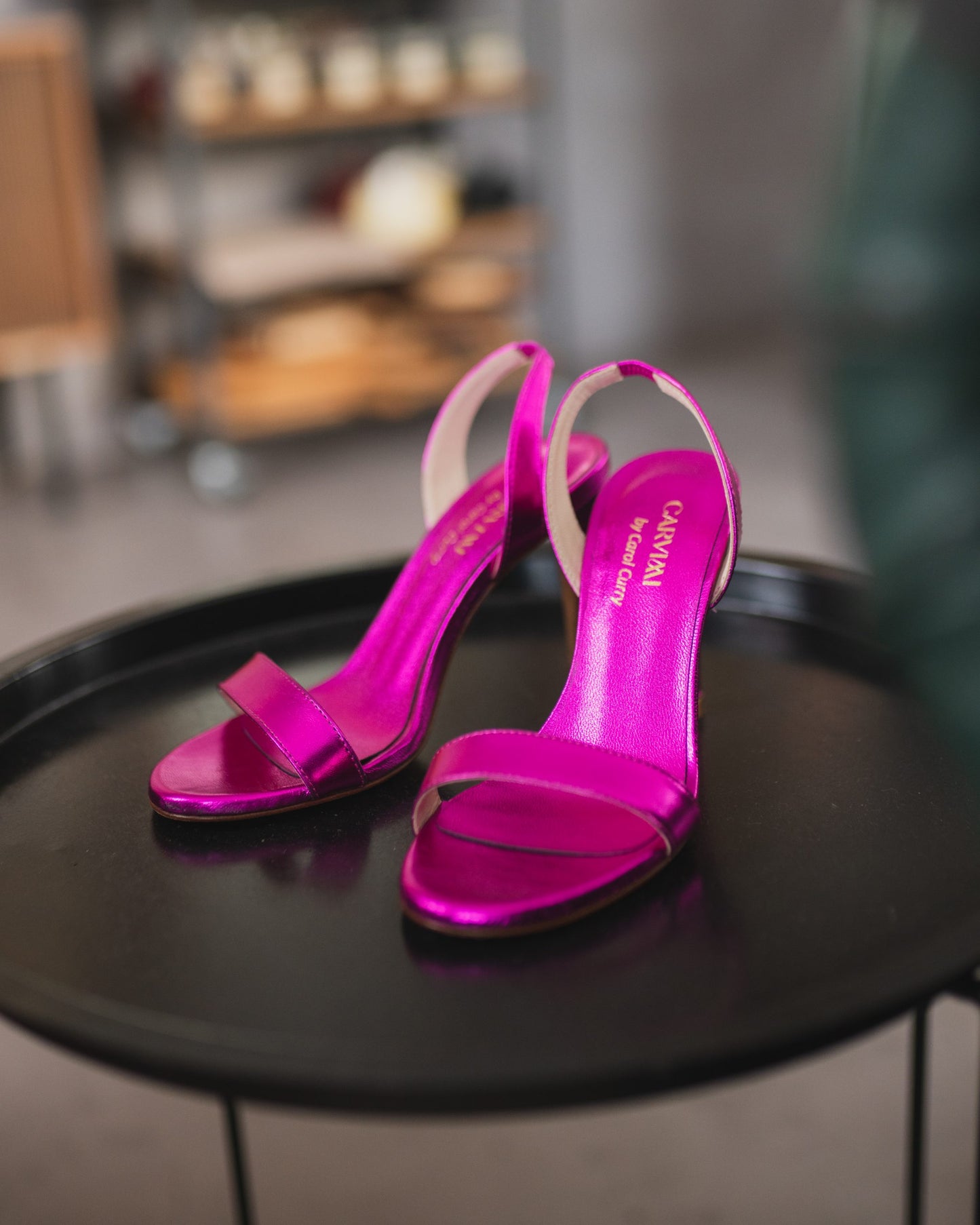 Leather sandals with heels by Carol Curry